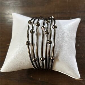 Elegant Silver and Gold Bangle Set